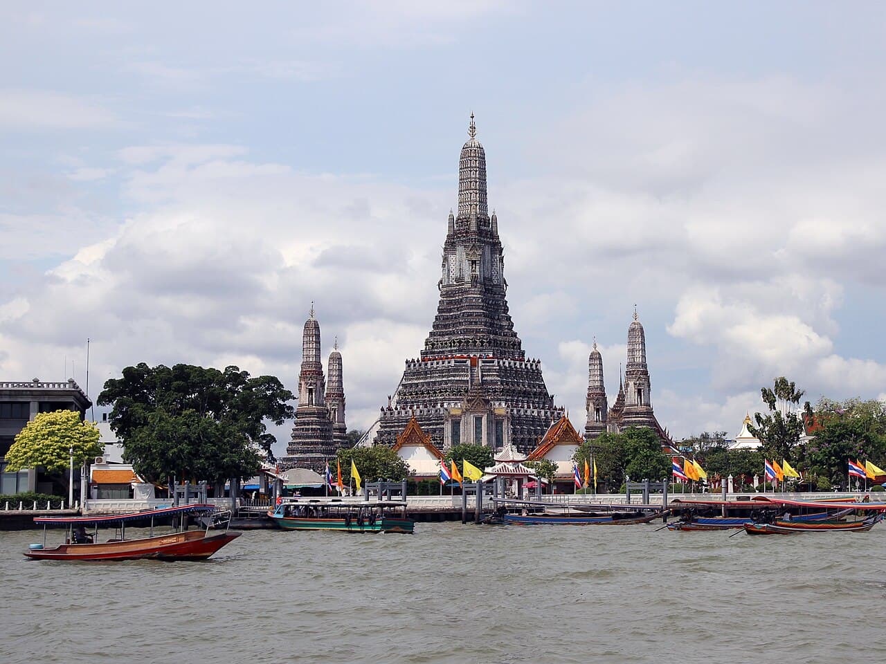 Wat Arun temple beside the Chao Phraya River in Bangkok