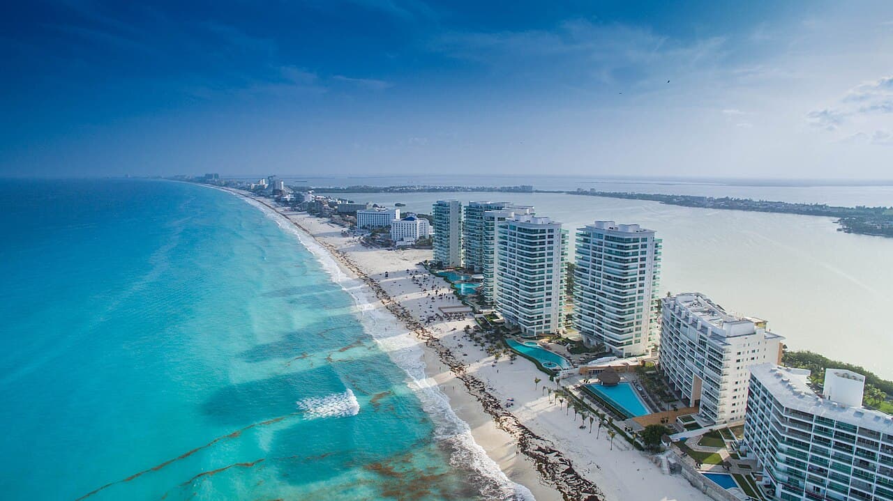 Aerial view of the beach and hotels along Cancún’s Hotel Zone
