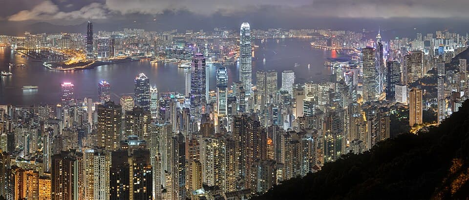 The illuminated Hong Kong skyline and Victoria Harbour viewed from Victoria Peak at night