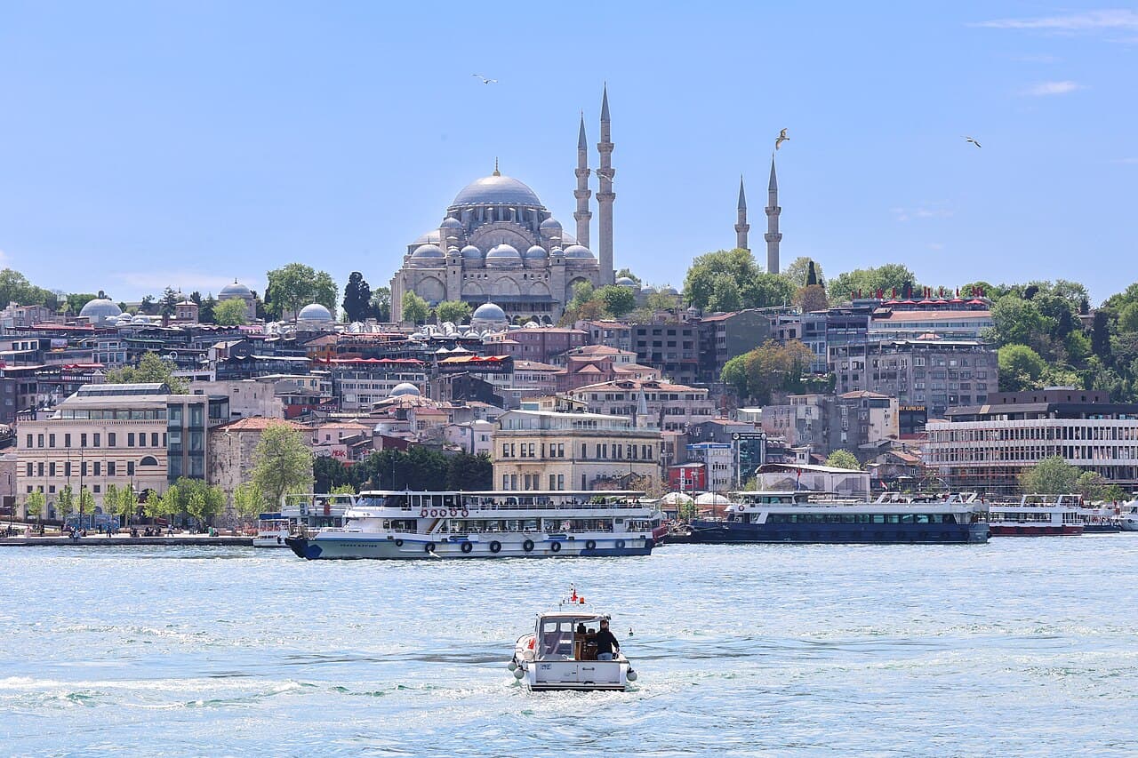 Süleymaniye Mosque and waterfront boats seen across the Golden Horn in Istanbul